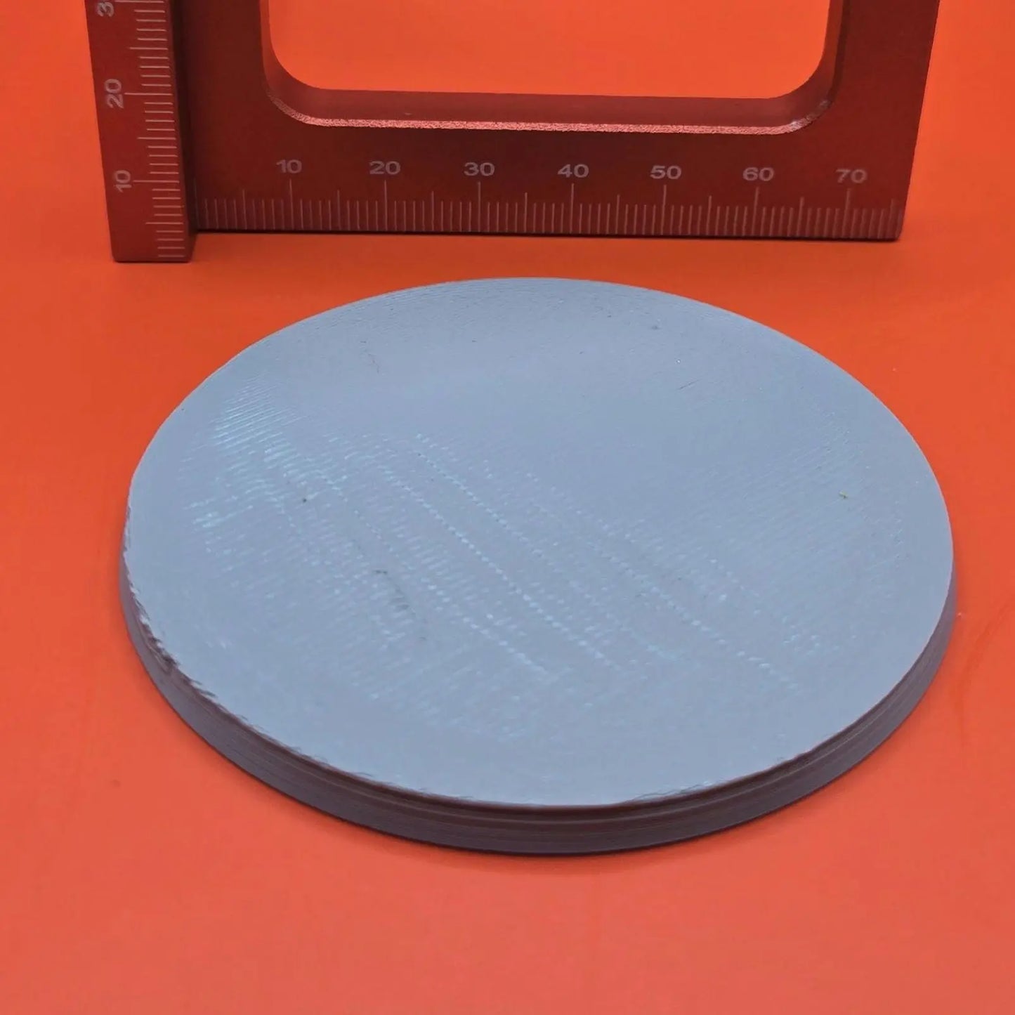 70mm base with an aesthetic 15 degree bevel