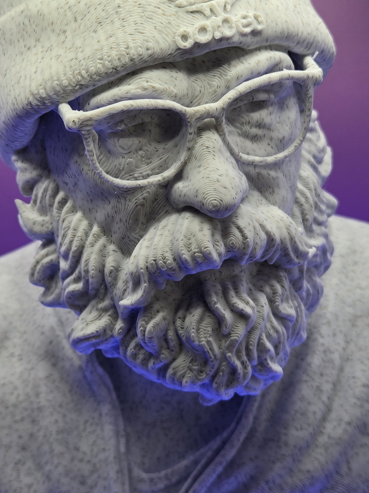 Alpha Male Bust by Mega Diamonds, close-up of the face and beard on the real Marble PLA filament print, showing the fine layer lines and speckled marble finish