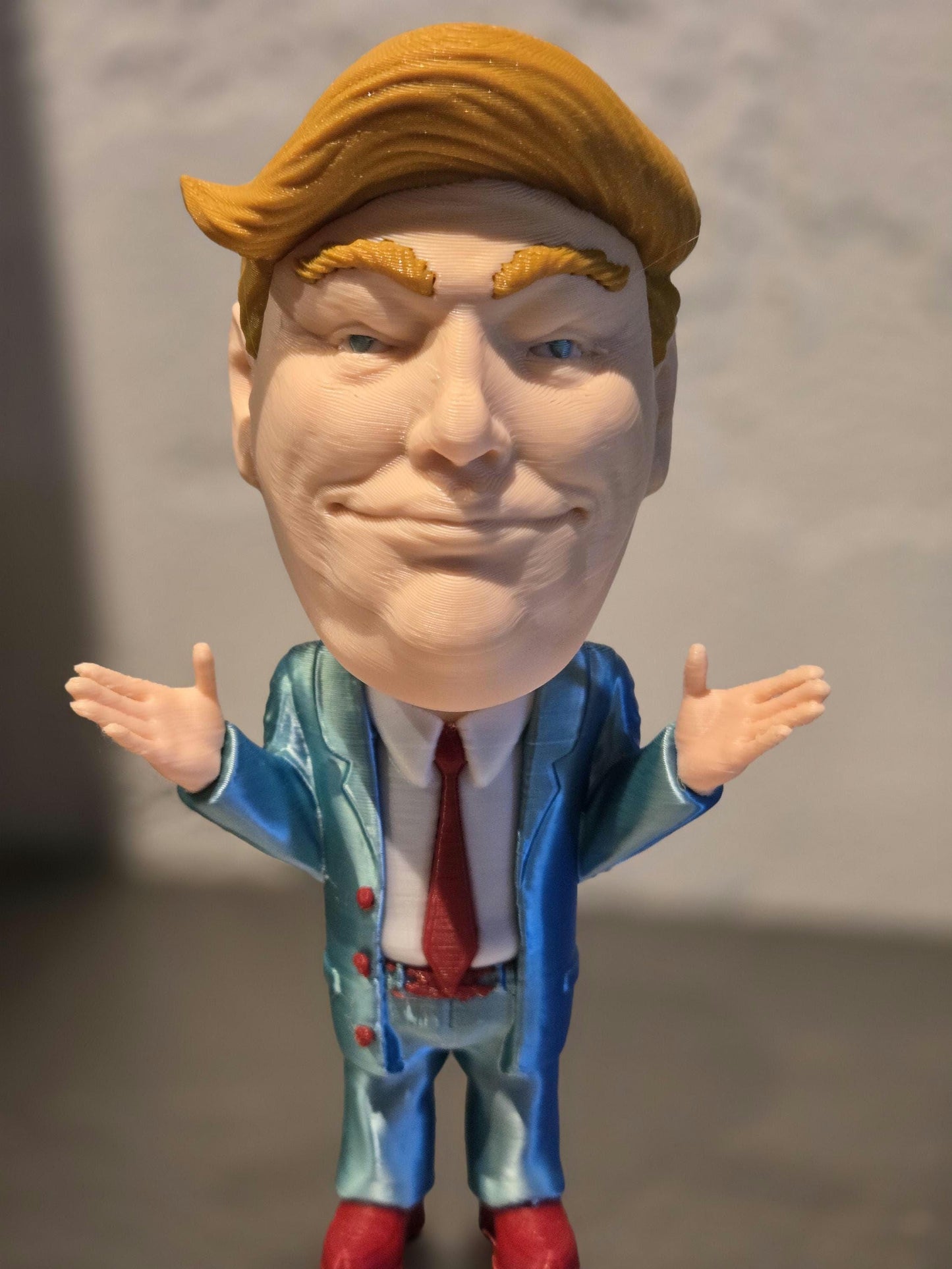 4 color print of Trump Bobble head with Red details