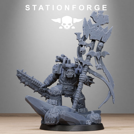 Orkaz Boo Basher by Station Forge – armoured slasher ork with spiked chainsword and skull totem pole on a pumpkin rock base topper